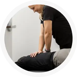 therapist giving back massage